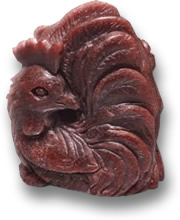 Intaglio del gallo in granato piropo
