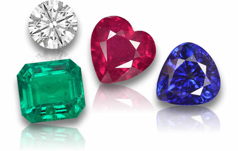 Pietre preziose sfuse tra cui rubino, zaffiro, smeraldo e diamante