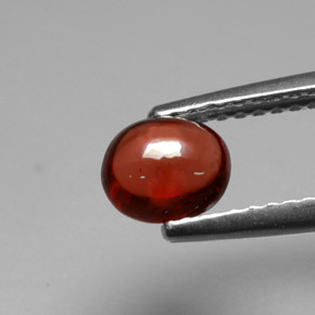 Granato Almandino Rosso arancione naturale da 0.88 ct, Taglio ovale, Traslucido