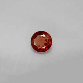 Granato Almandino Rosso arancione naturale da 0.77 ct, Taglio rotondo, VVS-VS
