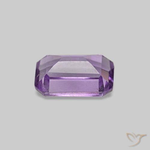 Ametista Viola tendente al rosa naturale da 0.52 ct, Taglio smeraldo, VS