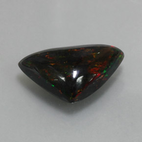 Opale nero naturale multicolore da 3,94 ct, trillion, opaco