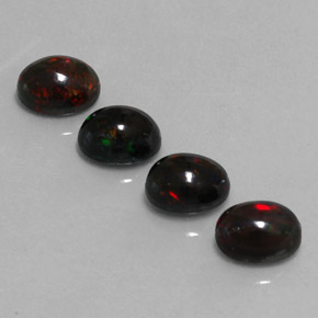 Opale nero naturale multicolore da  ct, taglio ovale, opaco
