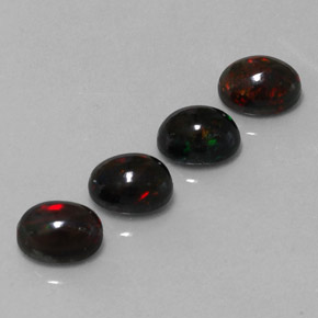 Opale nero naturale multicolore da  ct, taglio ovale, opaco