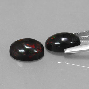 Opale nero naturale multicolore da  ct, taglio ovale, opaco