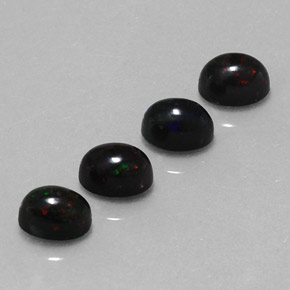 Opale nero naturale multicolore da  ct, taglio ovale, opaco