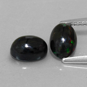 Opale nero naturale multicolore da  ct, taglio ovale, opaco