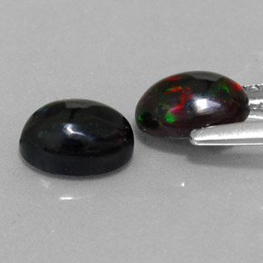 Opale nero naturale multicolore da  ct, taglio ovale, opaco