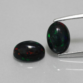 Opale nero naturale multicolore da  ct, taglio ovale, opaco