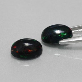 Opale nero naturale multicolore da  ct, taglio ovale, opaco