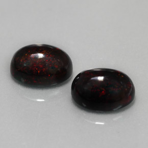 Opale nero naturale multicolore da  ct, taglio ovale, opaco