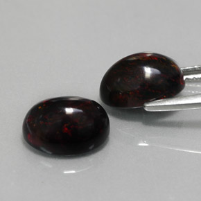 Opale nero naturale multicolore da  ct, taglio ovale, opaco