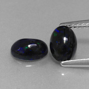 Opale nero naturale multicolore da  ct, taglio ovale, opaco