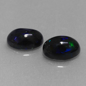 Opale nero naturale multicolore da  ct, taglio ovale, opaco