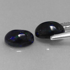Opale nero naturale multicolore da  ct, taglio ovale, opaco