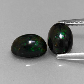 Opale nero naturale multicolore da  ct, taglio ovale, opaco