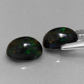 Opale nero naturale multicolore da  ct, taglio ovale, opaco