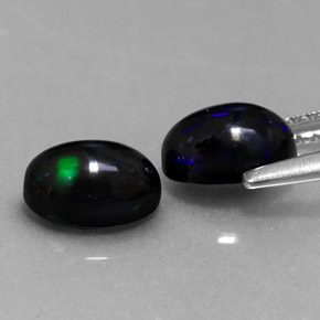 Opale nero naturale multicolore da  ct, taglio ovale, opaco
