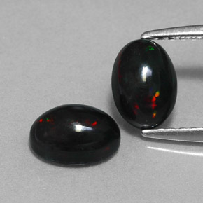 Opale nero naturale multicolore da  ct, taglio ovale, opaco
