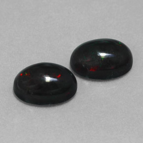 Opale nero naturale multicolore da  ct, taglio ovale, opaco