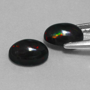 Opale nero naturale multicolore da  ct, taglio ovale, opaco