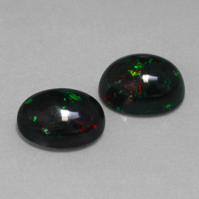 Opale nero naturale multicolore da  ct, taglio ovale, opaco