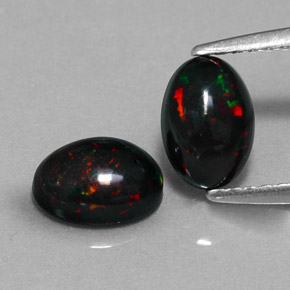 Opale nero naturale multicolore da  ct, taglio ovale, opaco