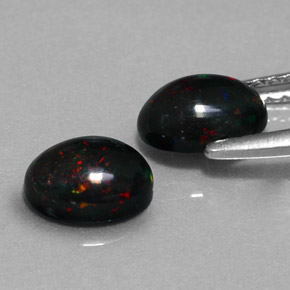 Opale nero naturale multicolore da  ct, taglio ovale, opaco