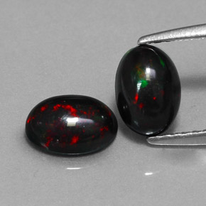 Opale nero naturale multicolore da  ct, taglio ovale, opaco