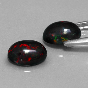 Opale nero naturale multicolore da  ct, taglio ovale, opaco