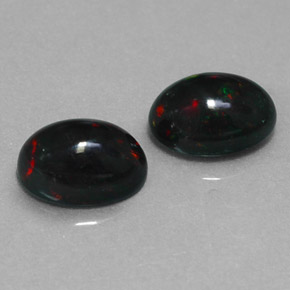 Opale nero naturale multicolore da  ct, taglio ovale, opaco