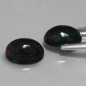 Opale nero naturale multicolore da  ct, taglio ovale, opaco