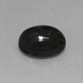 Opale nero naturale multicolore da 1,27 ct, taglio ovale, opaco