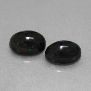 Opale nero naturale multicolore da  ct, taglio ovale, opaco