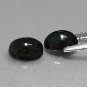 Opale nero naturale multicolore da  ct, taglio ovale, opaco