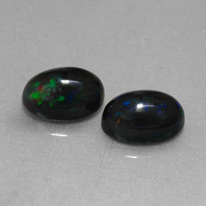 Opale nero naturale multicolore da  ct, taglio ovale, opaco