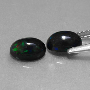Opale nero naturale multicolore da  ct, taglio ovale, opaco