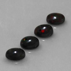 Opale nero naturale multicolore da  ct, taglio ovale, opaco
