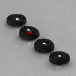 Opale nero naturale multicolore da  ct, taglio ovale, opaco