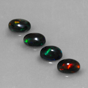 Opale nero naturale multicolore da  ct, taglio ovale, opaco