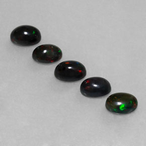 Opale nero naturale multicolore da  ct, taglio ovale, opaco
