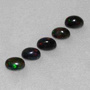 Opale nero naturale multicolore da  ct, taglio ovale, opaco