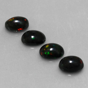 Opale nero naturale multicolore da  ct, taglio ovale, opaco