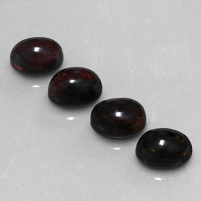 Opale nero naturale multicolore da  ct, taglio ovale, opaco