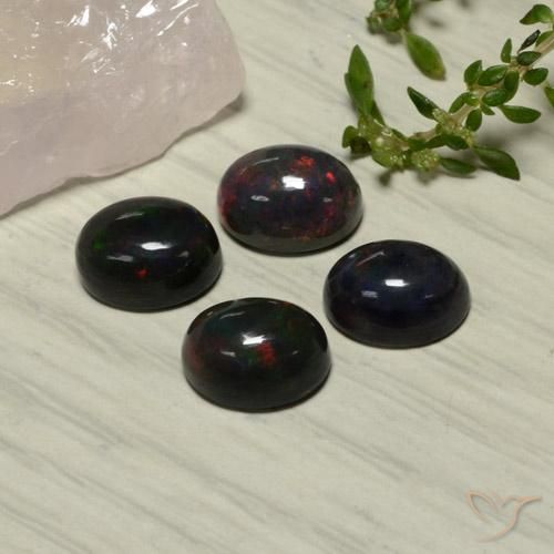 Opale nero naturale rosso da 5,81 ct, taglio ovale, traslucido