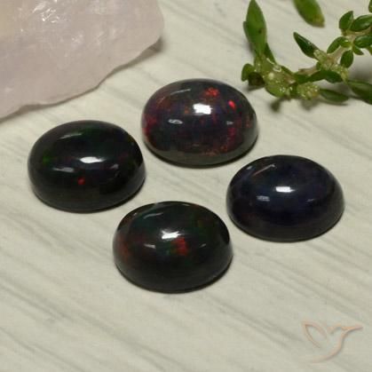 Opale nero naturale rosso da 5,81 ct, taglio ovale, traslucido