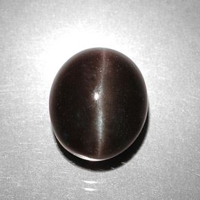 Scapolite occhio di gatto Marrone scuro naturale da 5.85 ct, Taglio ovale, Traslucido