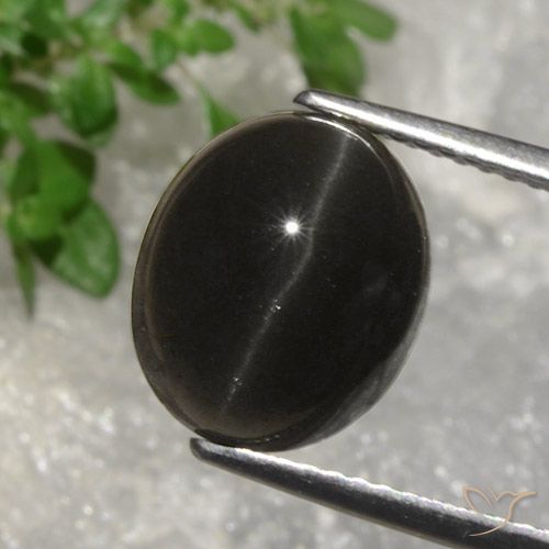5.07ct Naturale Marrone scuro Scapolite occhio di gatto, Ovale, Traslucido