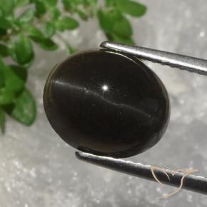 Scapolite occhio di gatto Marrone scuro naturale da 5.07 ct, Ovale, Traslucido