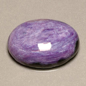 Caroite naturale viola da 9,97 ct, taglio ovale, opaco